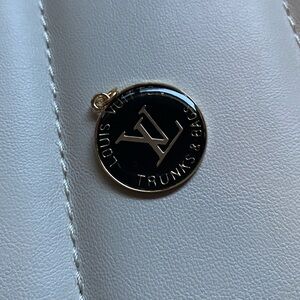 Gold & Black LV zipper pull trunks and bags